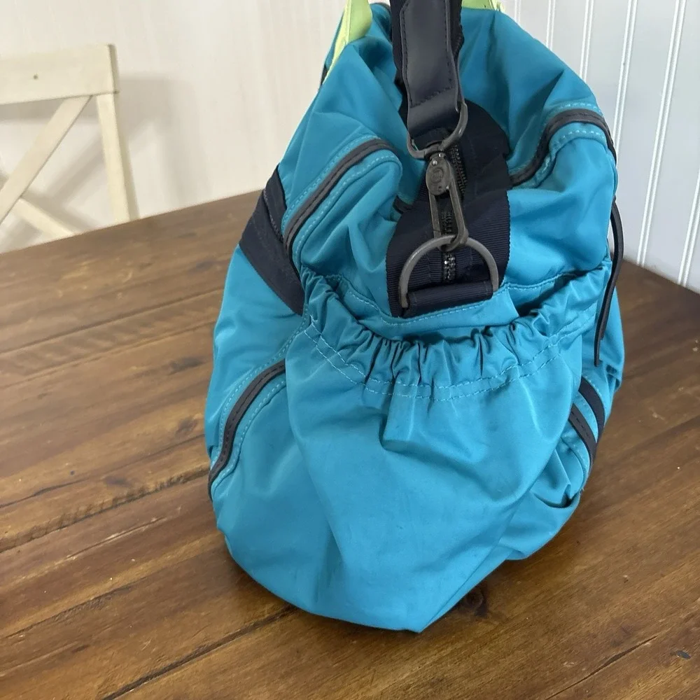 Lululemon Weekend Warrior Duffel Bag Surge Clear Mint Inkwell Blue Green Pockets